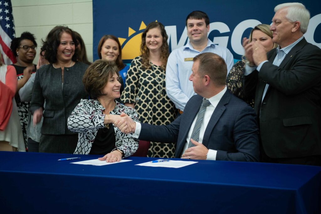 MGCCC president Dr Mary S Graham and Andy Swoger Keesler Federal’s CEO and president sign an agreement for the new Bank Branch Manager Apprenticeship Program