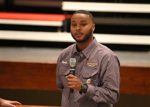David Butler, Maintenance Technician, speaks to sophomores at Clinton High School